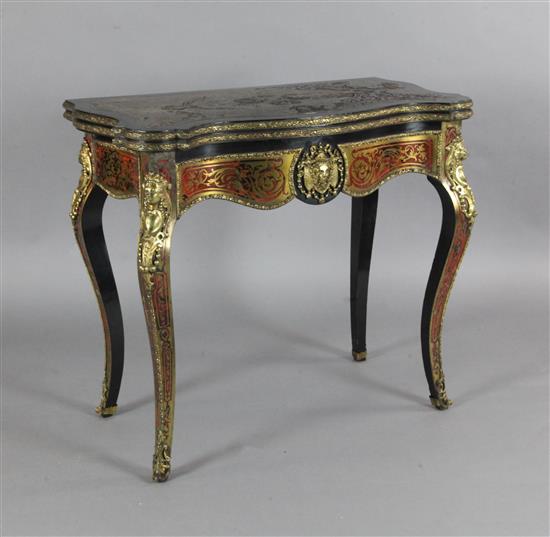 A mid 19th century French red boullework card table, W.2ft 11in. D.1ft 6in. H.2ft 7in.